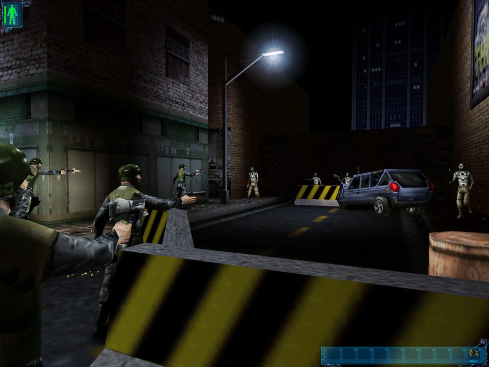 Screenshot from Deus Ex depicting a street skirmish, with several armed soldier-like figures standing around blockades and a car in the background.