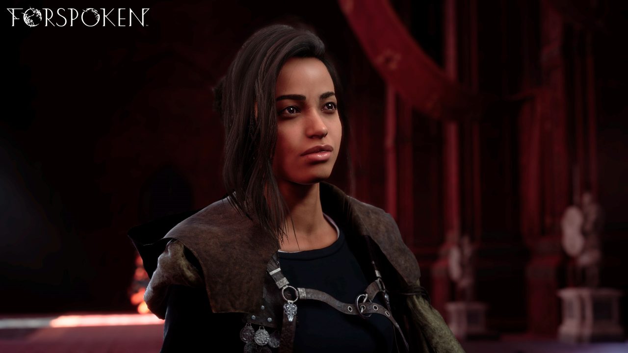 Frey, the protagonist of Forspoken, looks over to the left in a dark, stone corridor.