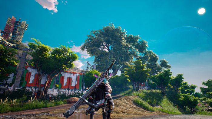 The protagonist of Biomutant looks out at a moss-laden outpost, deep in a green forest.