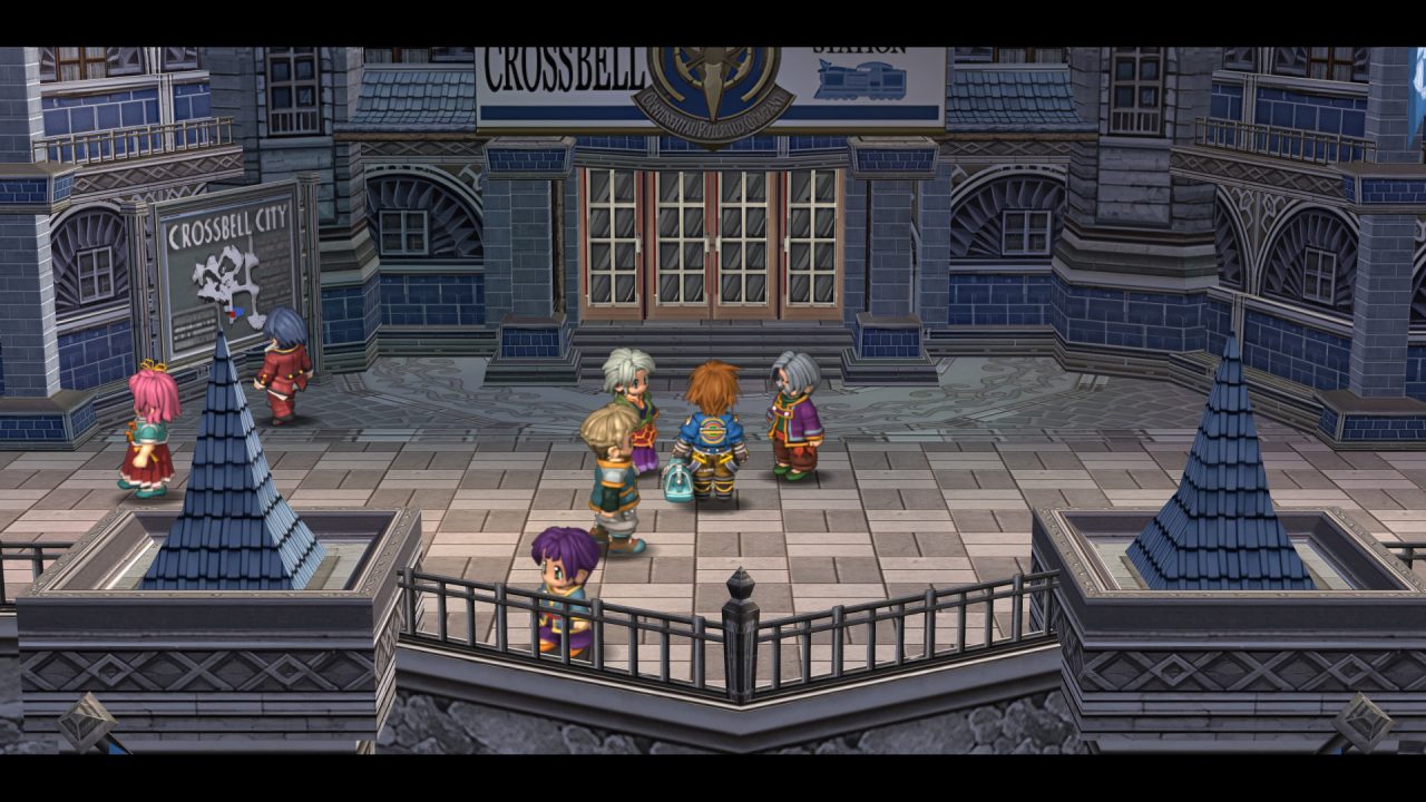 The Legend of Heroes: Trails from Zero (PC) screenshot of Lloyd standing outside Crossbell Station with an elderly couple while passersby walk around them.