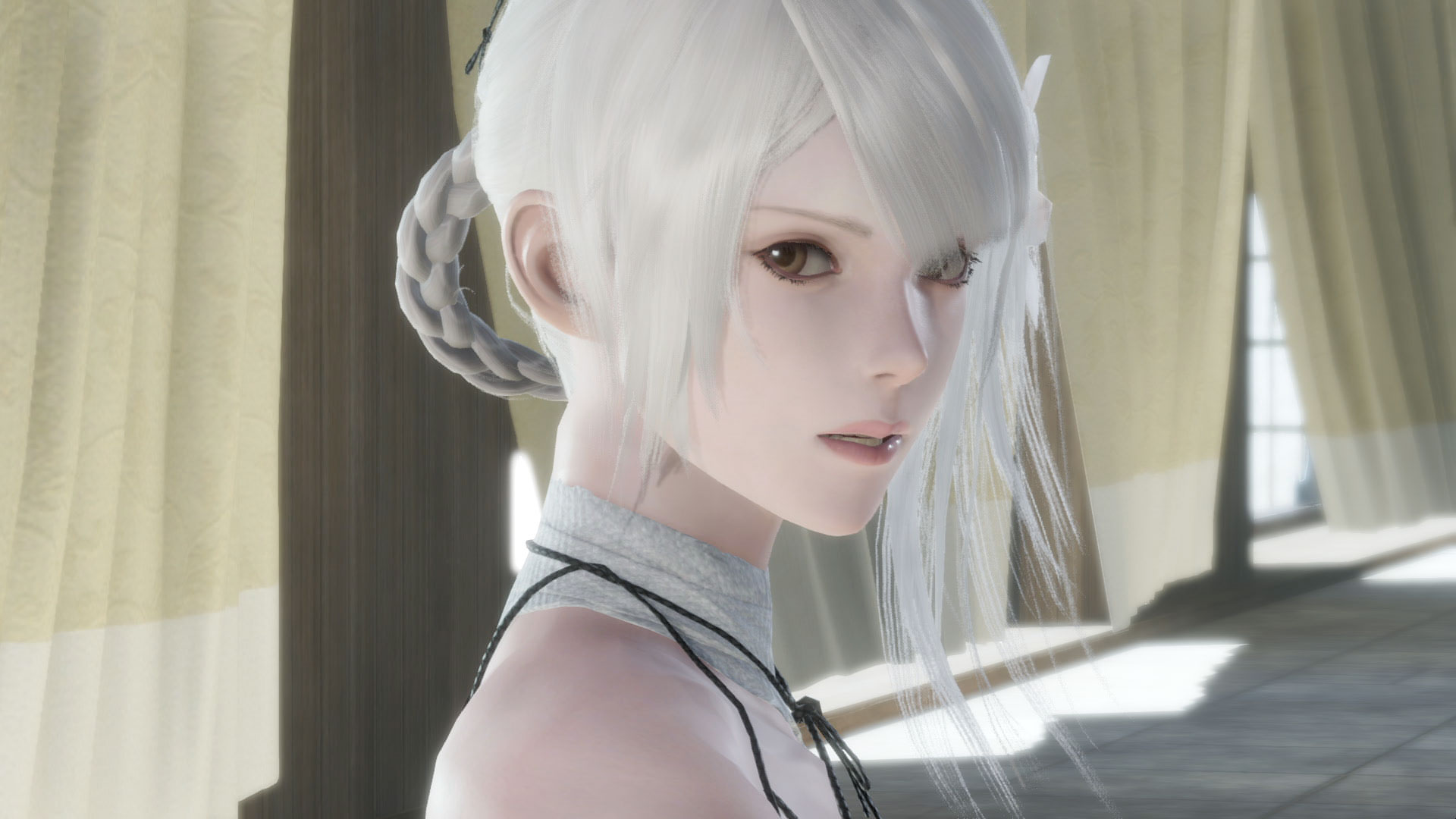 Kaine, a protagonist of NieR Replicant, looks at the player with brown eyes and long white hair framing her face.