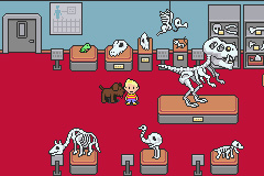 Mother 3 screenshot of Lucas at the museum with dinosaur skeletons on display around him.