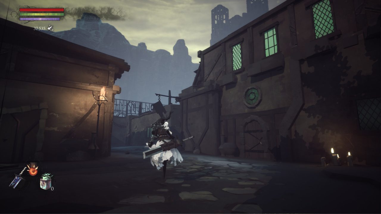 Roaming through a darkly-lit town in Shattered - Tale of the Forgotten King.