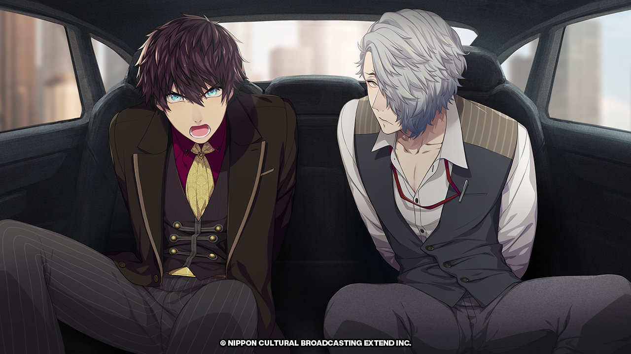 Limbo (left) and Shu (right) with their hands tied behind their backs, sitting in the backseat of a car.