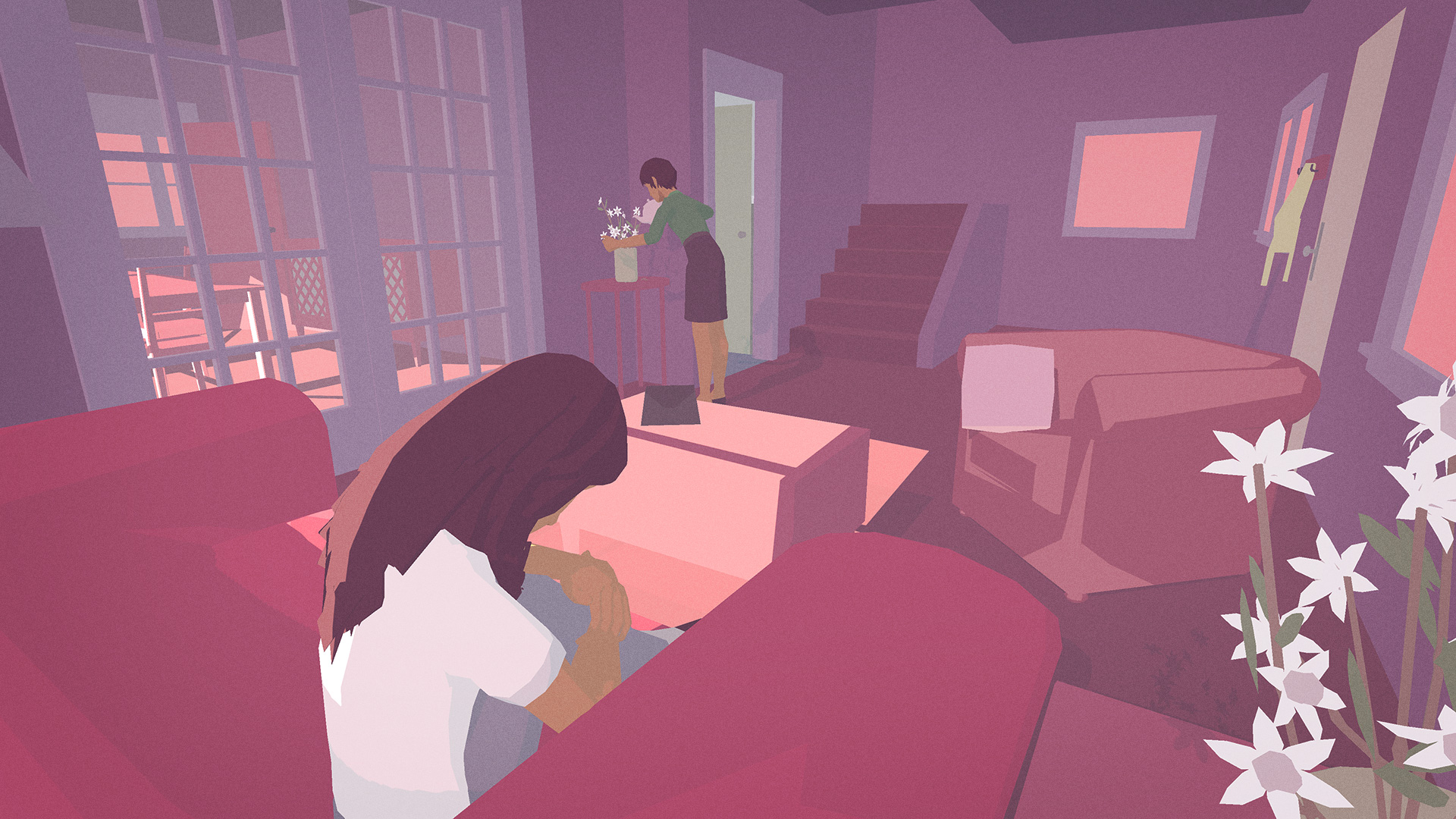 In the game Hindsight, a woman sits in a maroon couch, while another woman wearing a green dress water flowers in a vase.