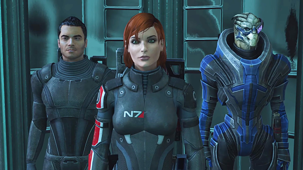 Mass Effect Legendary Edition screenshot of a female Shepard (center), Kaidan Alenko (left), and Garrus Vakarian (right) standing in an elevator on Noveria.