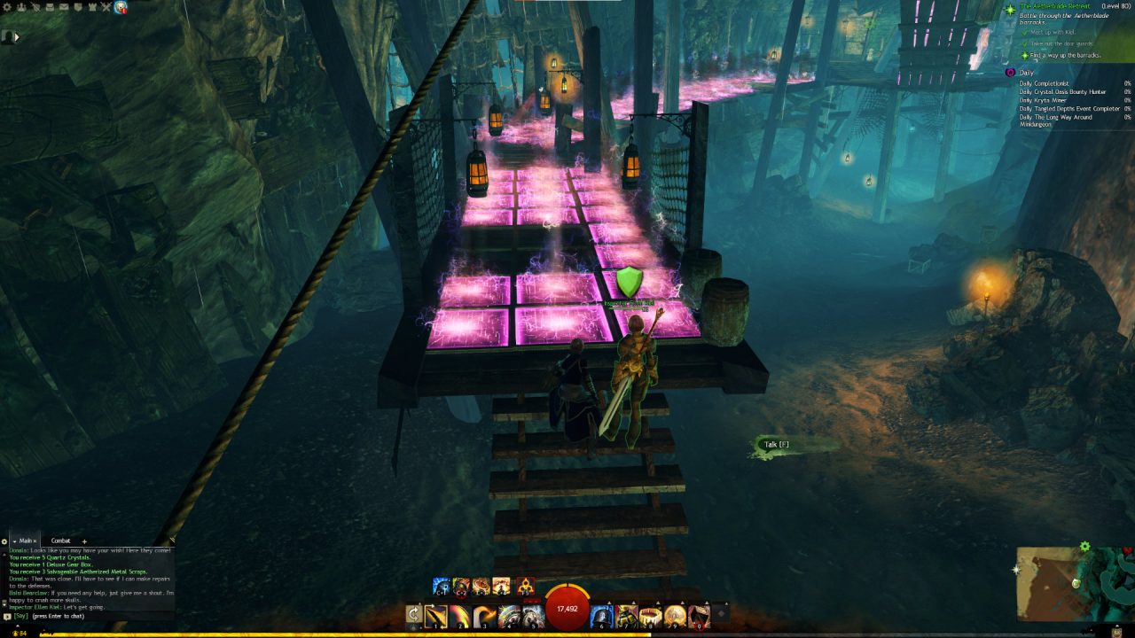 Guild Wars 2 screenshot featuring a magenta electric floor at the end of a stairwell.