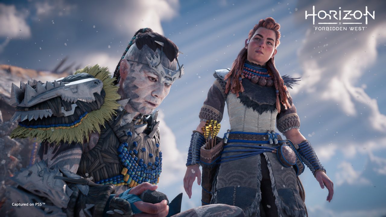 Horizon Forbidden West screenshot of Aloy meeting with Tenakth warrior Kotallo.