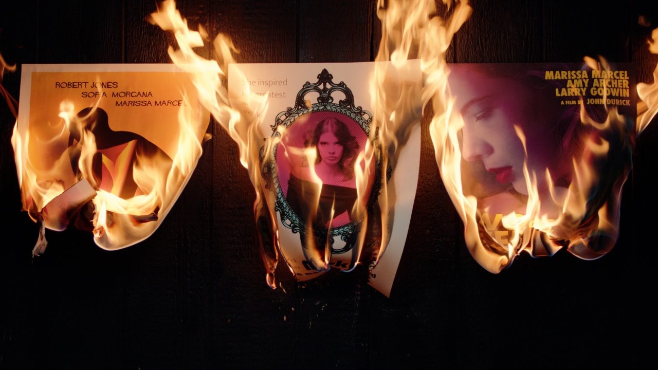 Screenshot of character portraits burning in Immortality