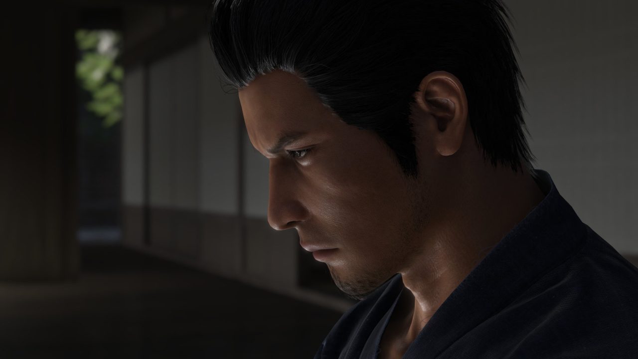 A screenshot of an aged Kazama Kiryu, the protagonist of Like A Dragon Gaiden: The Man Who Erased His Name, slightly bowing his head.