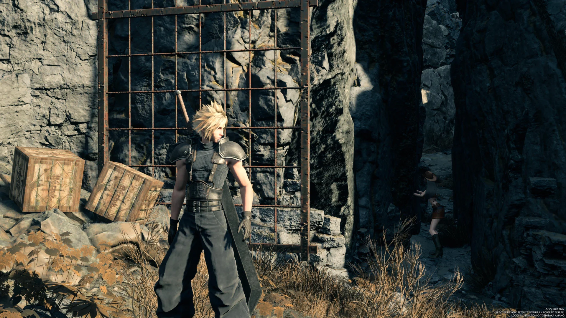 Cloud near some rocky walls and a crawl space in Final Fantasy VII Rebirth