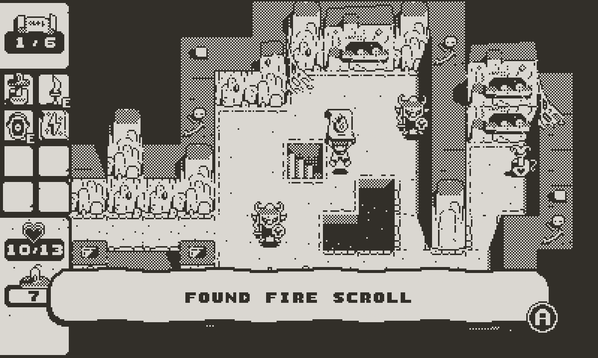 The player finds a fire scroll, their character holding the item triumphantly above their head in a pit- and monster-filled dungeon environment.