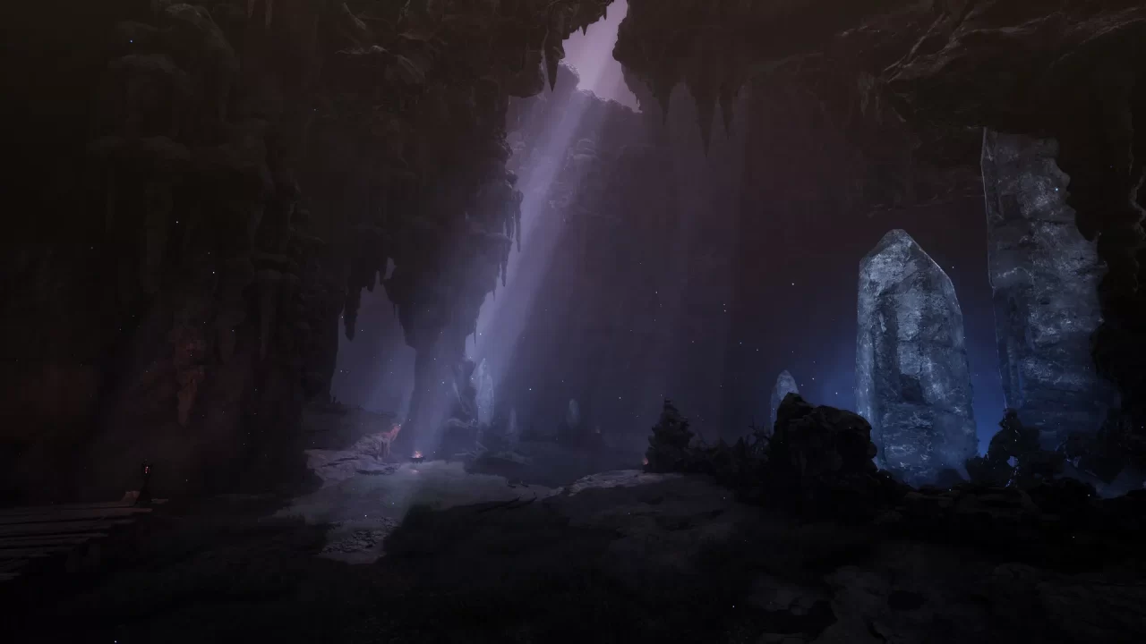 A shaft of light peaks through the dark cavern in The First Berserker: Khazan