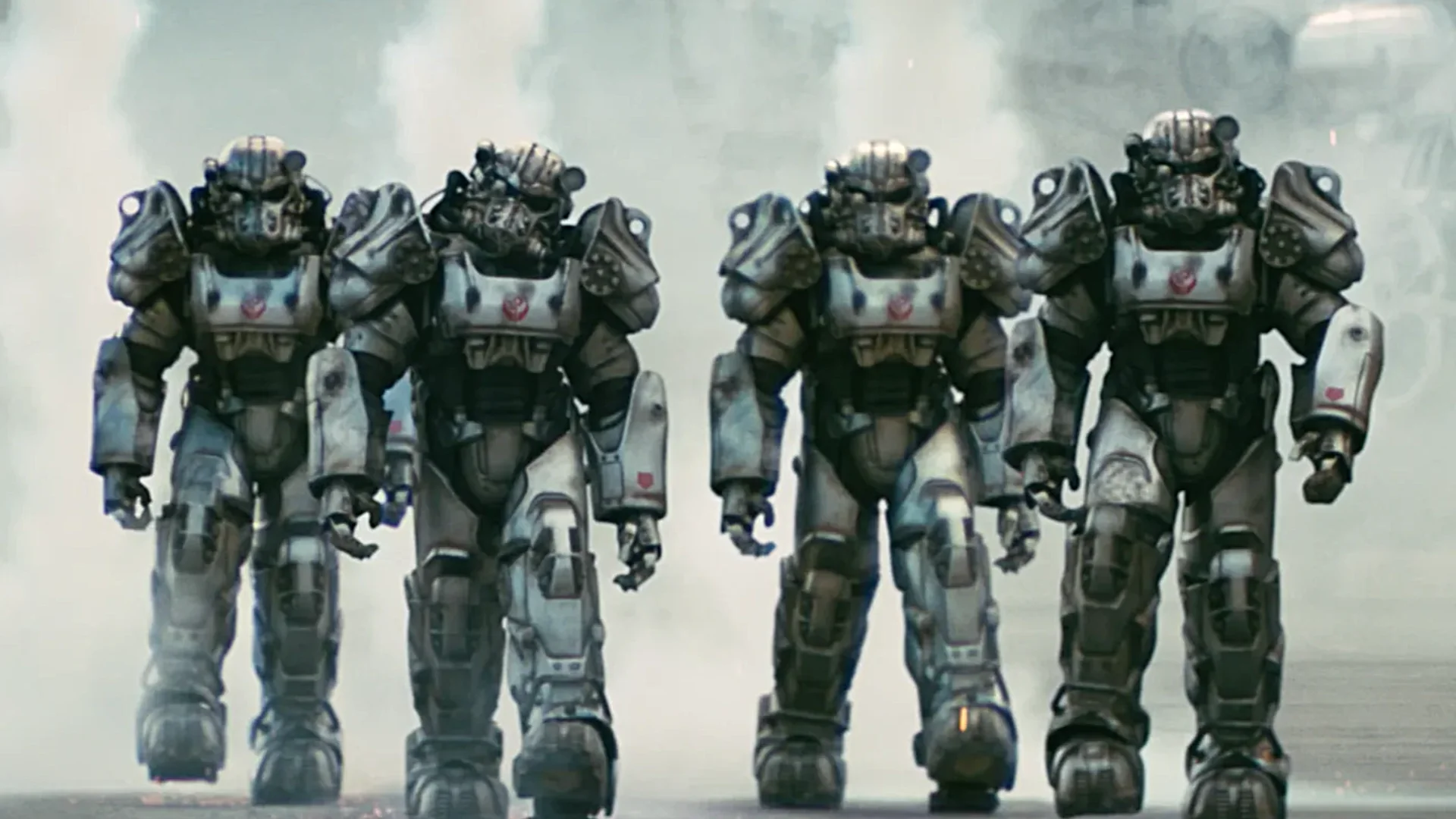 Armored figures walking forward from the Fallout TV show