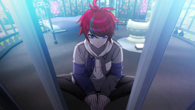 Takumi sits inside a cage, a blank expression on his face, in The Hundred Line.