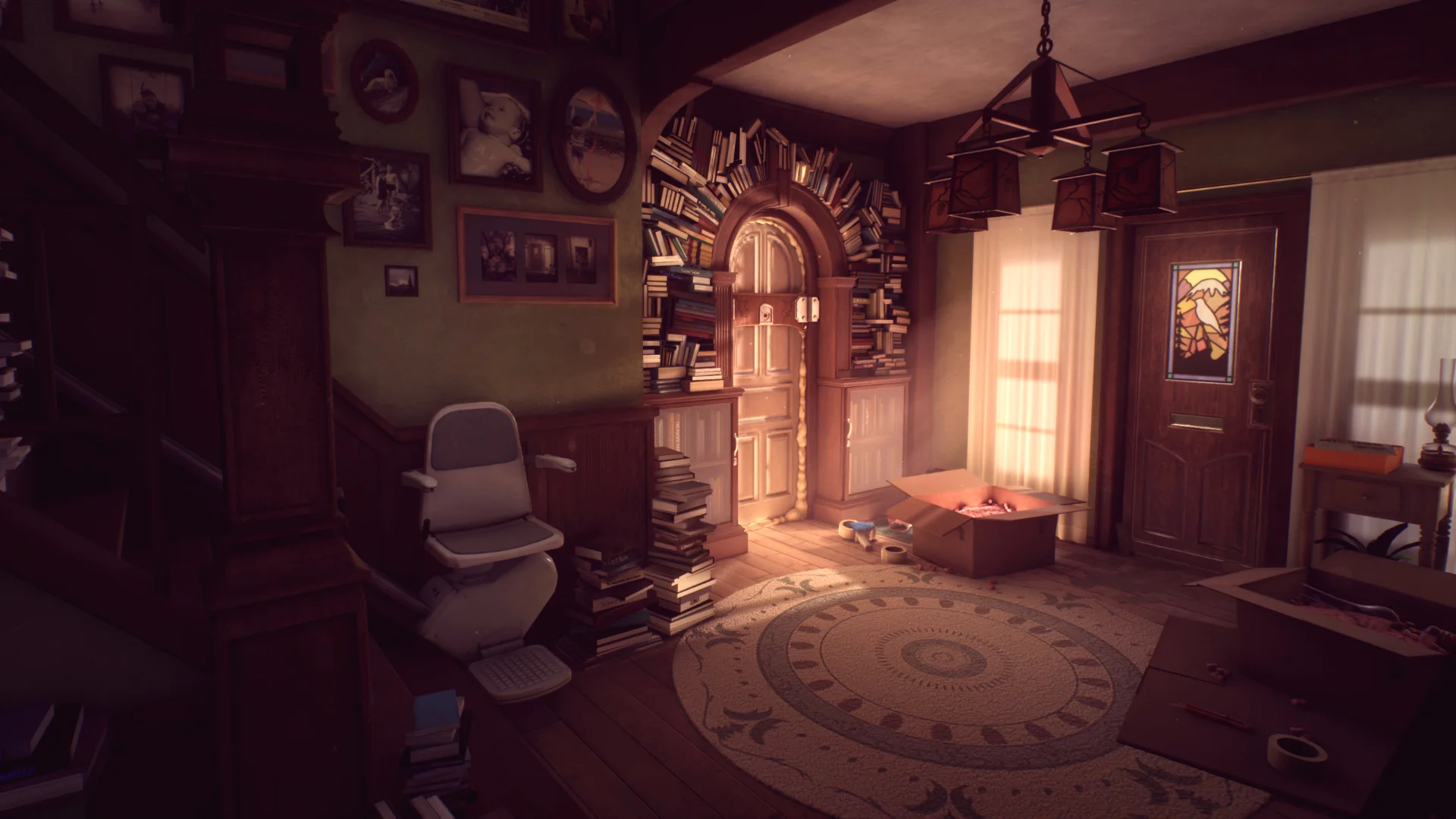 The entrance hall in What Remains of Edith Finch, dated furnishings in shades of brown, shelves packed full of books, stairlift visible at bottom of stairs.