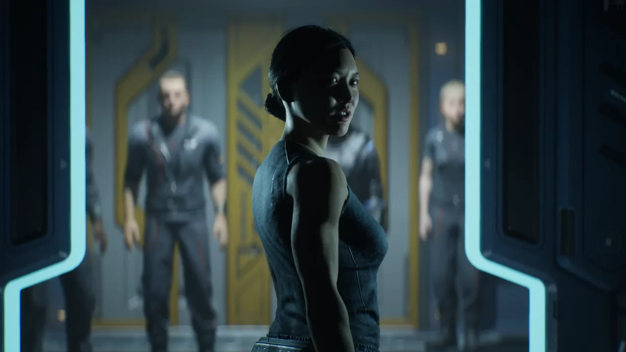 Medical Specialist Samantha Cooper looks back towards the viewer suspiciously with her crew in the background in Directive 8020.