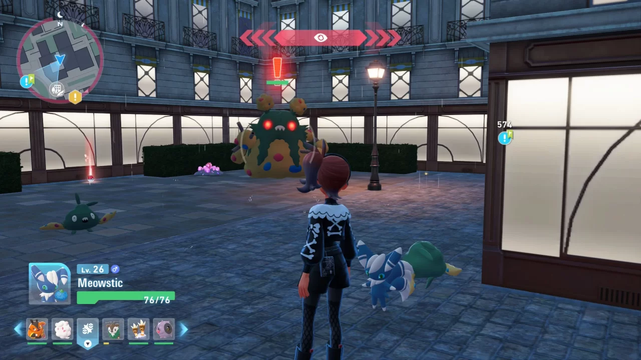 A Pokémon Legends: Z-A screenshot of the player being spotted by an Alpha Garbodor in an alley, surrounded by two wild Trubbish.