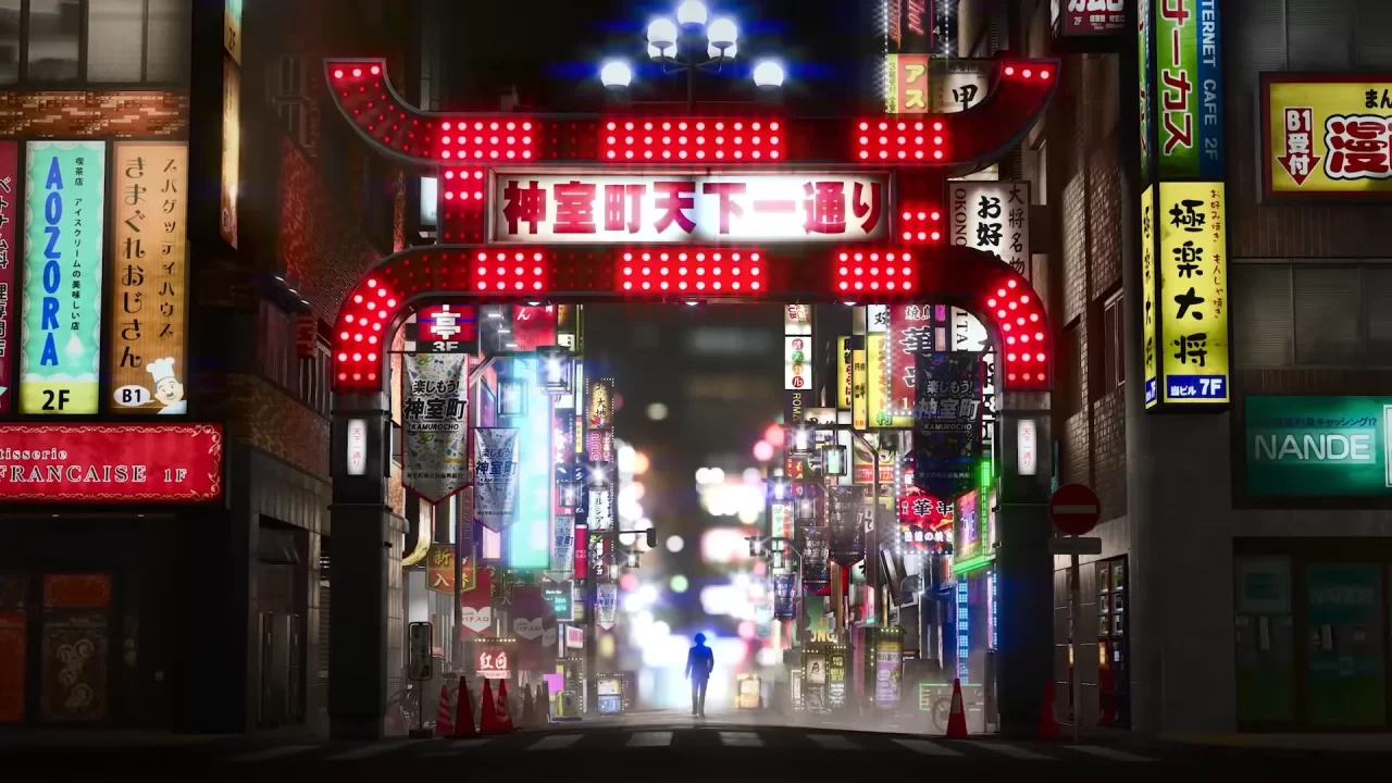 Screenshot of a tall red gate leading into the district of KamurochĆ from Yakuza / Like a Dragon 8.