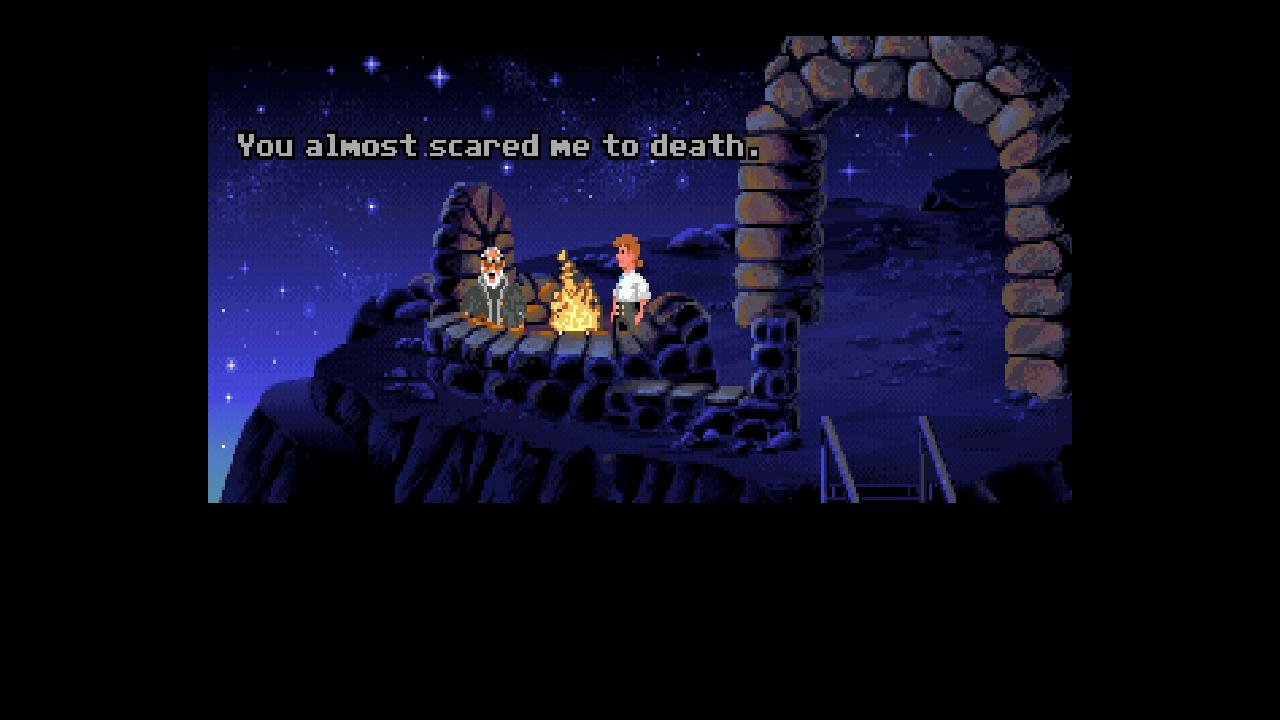 Guybrush stands with the watchman atop Melee Island in the classic version of The Secret of Monkey Island.