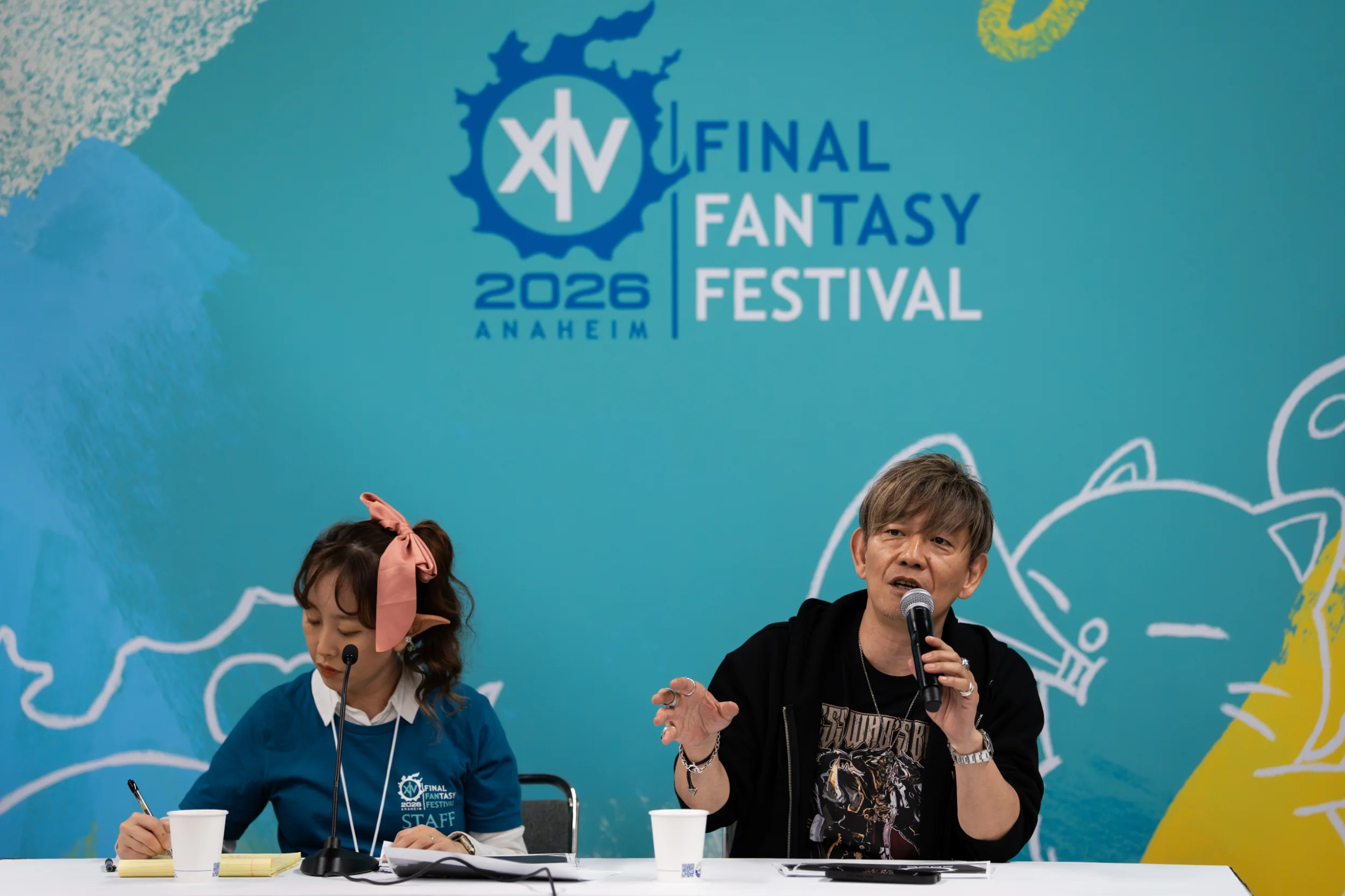 Final Fantasy XIV Evercold press conference photo of Naoki Yoshida and Aimi Tokutake