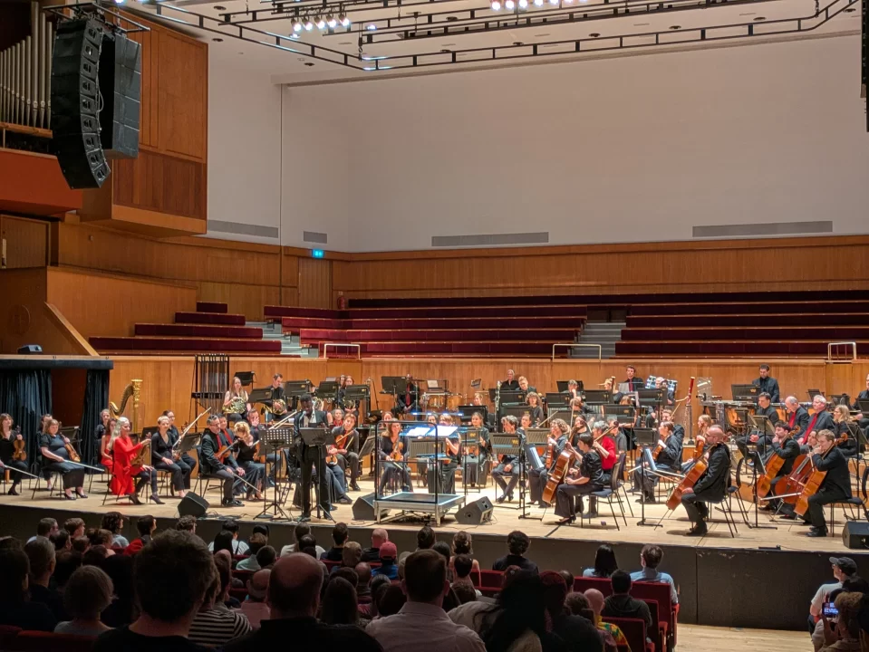 The orchestra at a distance for the Colors of Harmony concert,