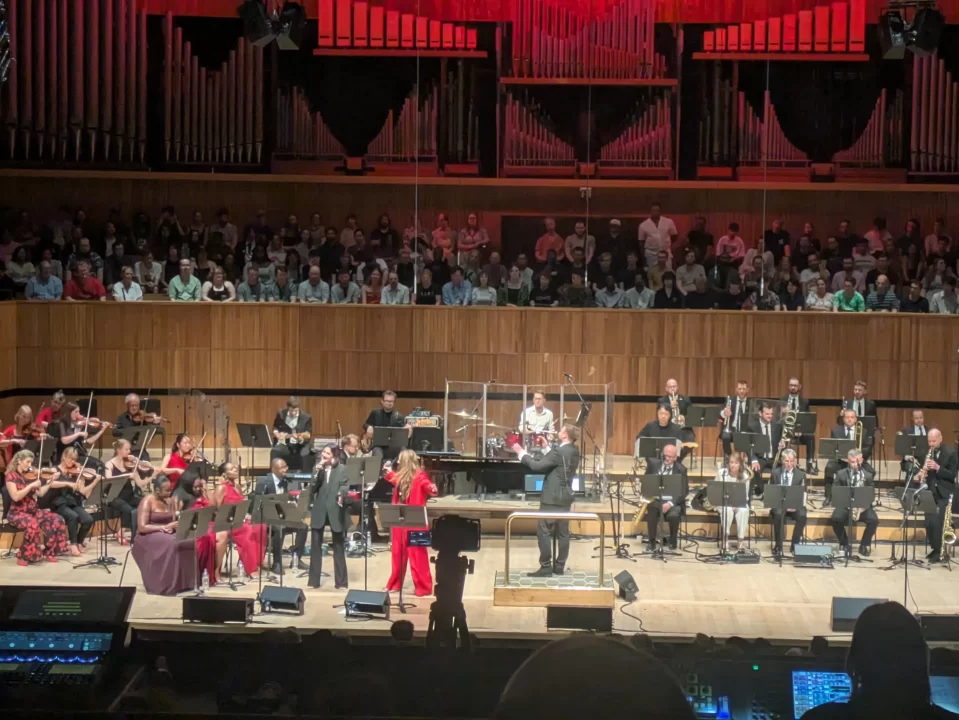 Vocalists mid-song at the Persona Grooves concert.